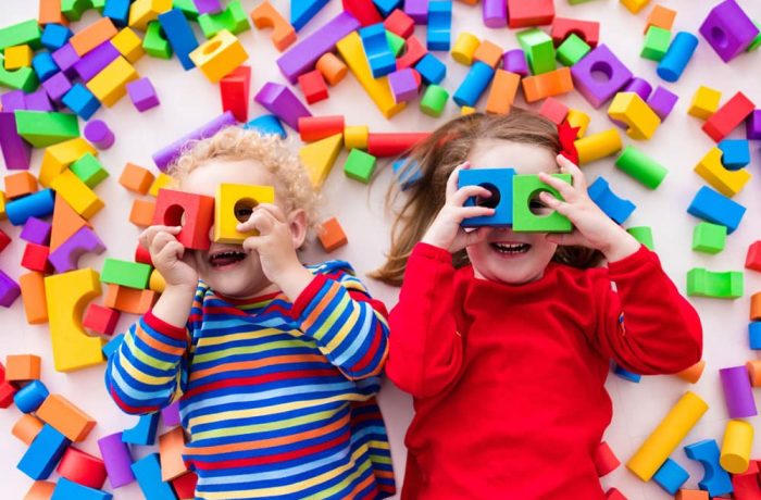 Children playing with colorful blocks